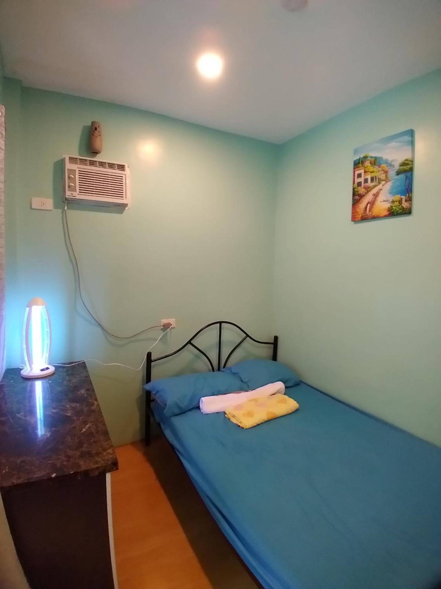 Azulea Lodging House Oslob Habitación foto