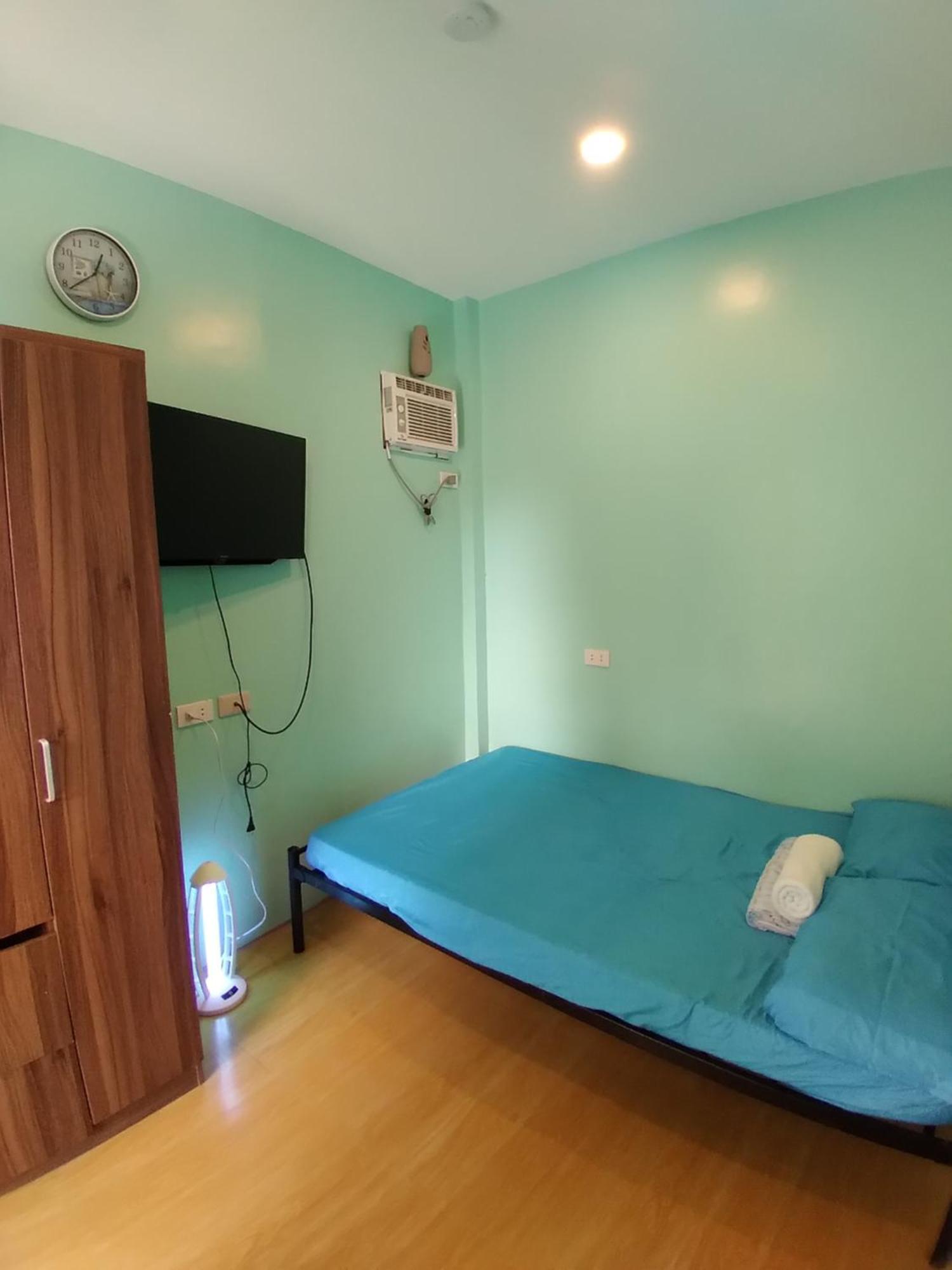Azulea Lodging House Oslob Habitación foto